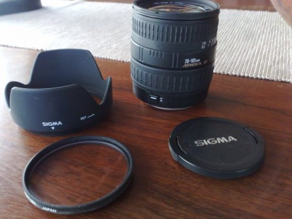 Camara Canon EOS reflex.lente.tele.bolso