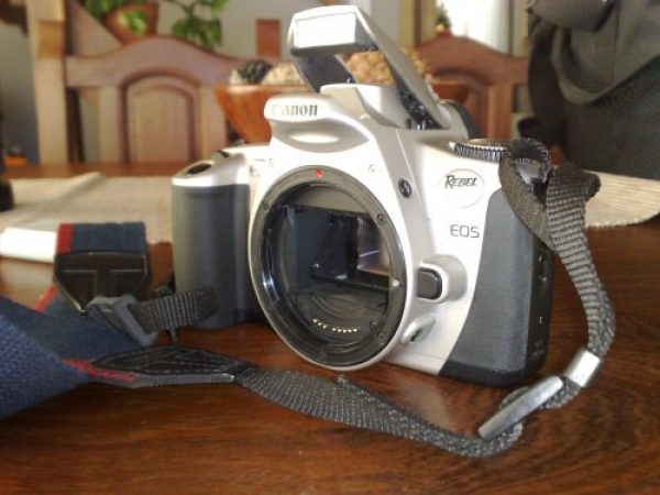 Camara Canon EOS reflex.lente.tele.bolso