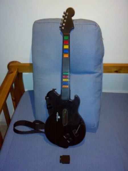 Play Station 2 + guitarra + 40 juegos